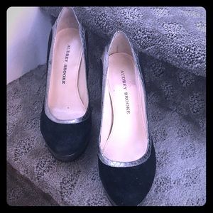 Silver and black suede pumps.